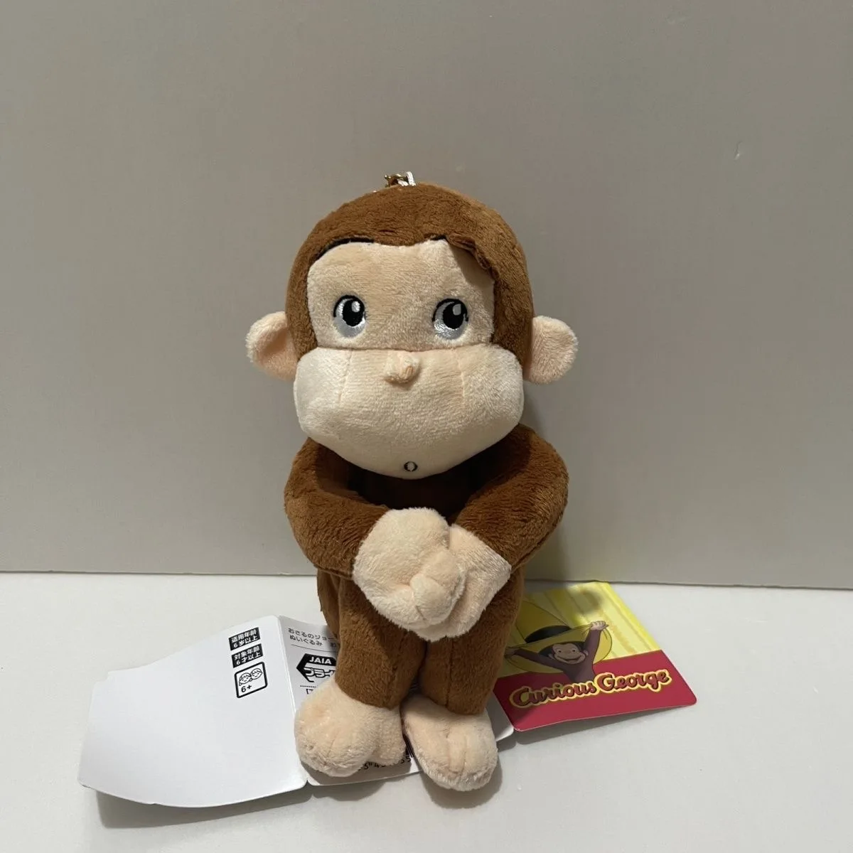 

New Cute Curious George Monkey Squatting Plush Key chain Small Pendant Kids Stuffed Animals Toys For Children 16CM