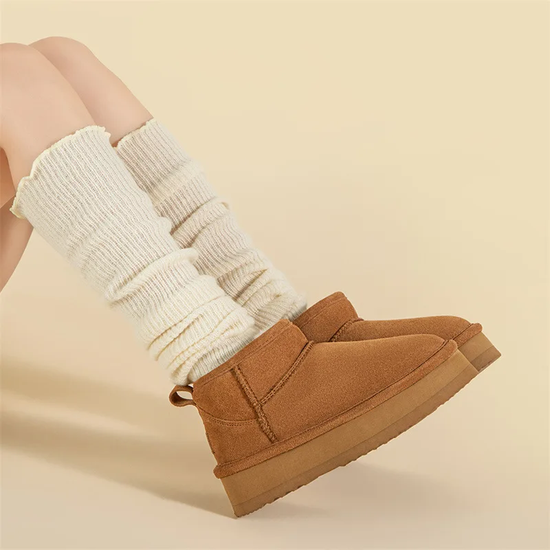 

genuine leather Snow boots women's sheepskin integrated thick soled short tube waterproof fashionable thick warm cotton shoes