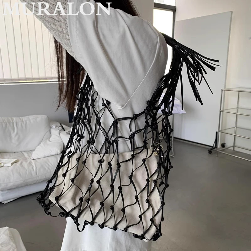 

2024 Niche Design Black Woven Shoulder Bag Summer Handmade Tassel Gold Ball Decor Bag Women's Hollow Leisure Fashion Armpit Bag