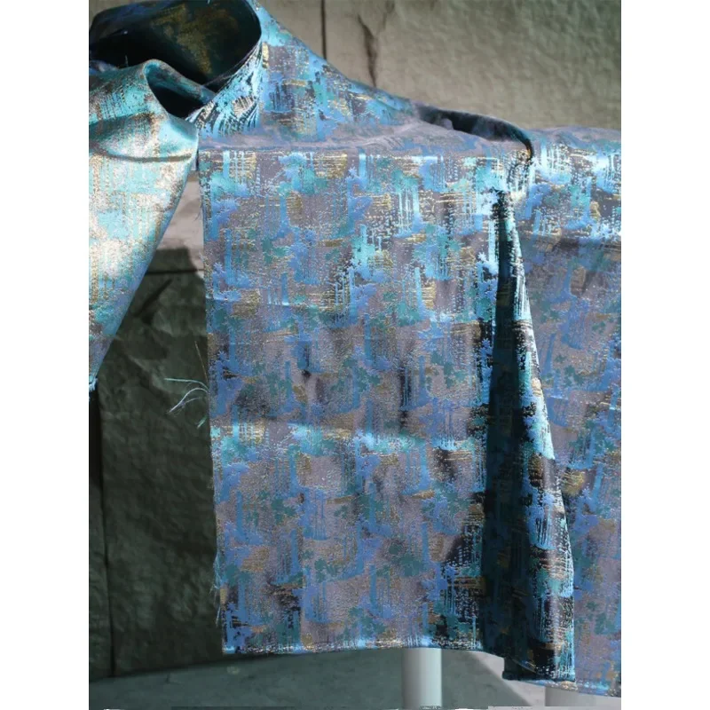 Blauer metallischer Glanz Graffiti Jacquard Stoff Muster Qipao Fotohintergrund Stoff Kleidung Designer Kreativer Stoff