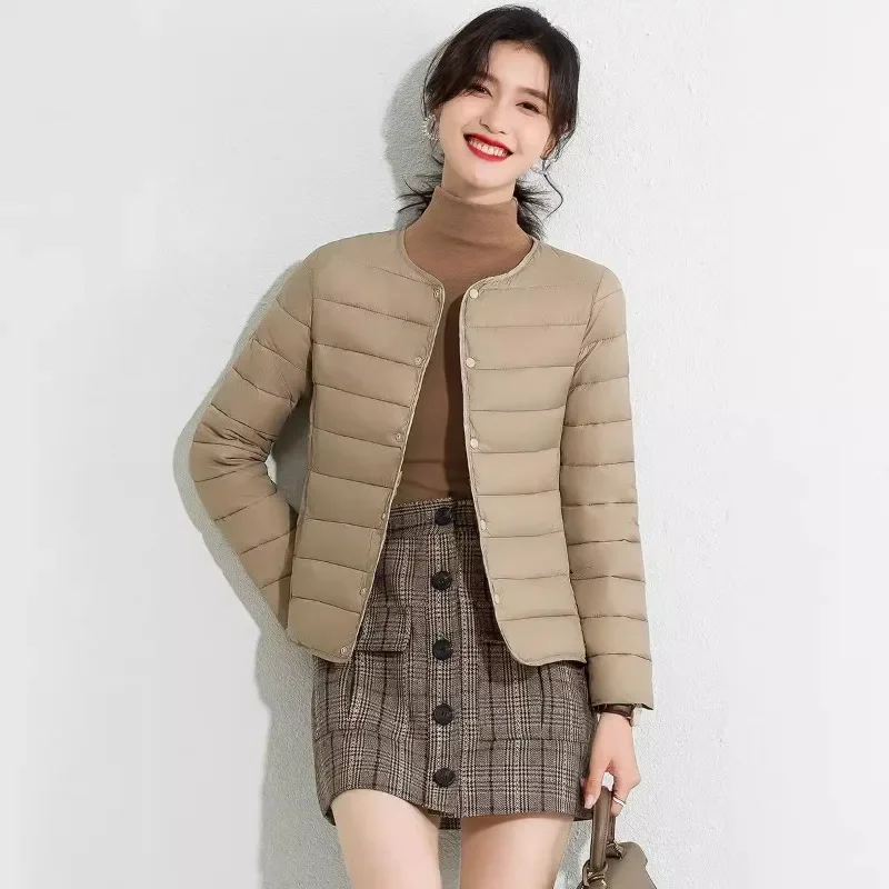

Женские легкие теплые пуховые хлопковые куртки с короткими утягивающими двойными внутренними подкладками и круглым вырезом, однобортная верхняя одежда