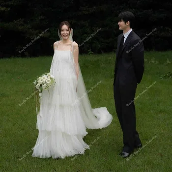 Abiti da sposa lunghi fino al pavimento in tulle a strati mo...