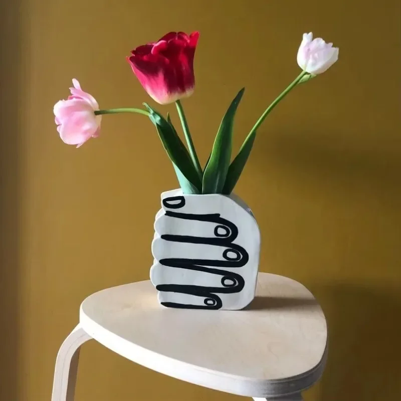 

White ceramic style hand-held painted shape resin vase