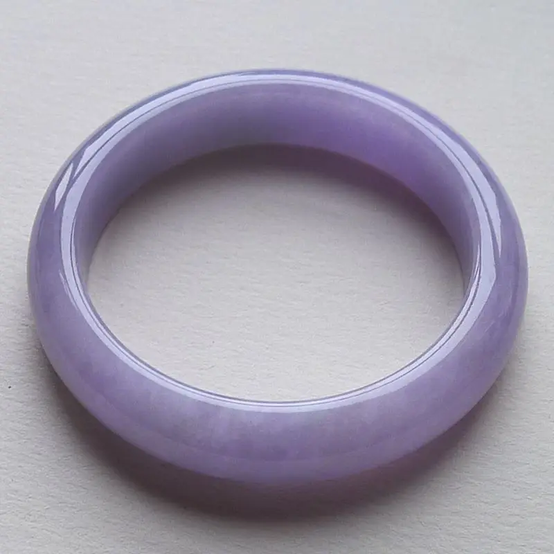 Delicate, Burmese bracelet for women featuring a smooth icy texture and a purple jade color