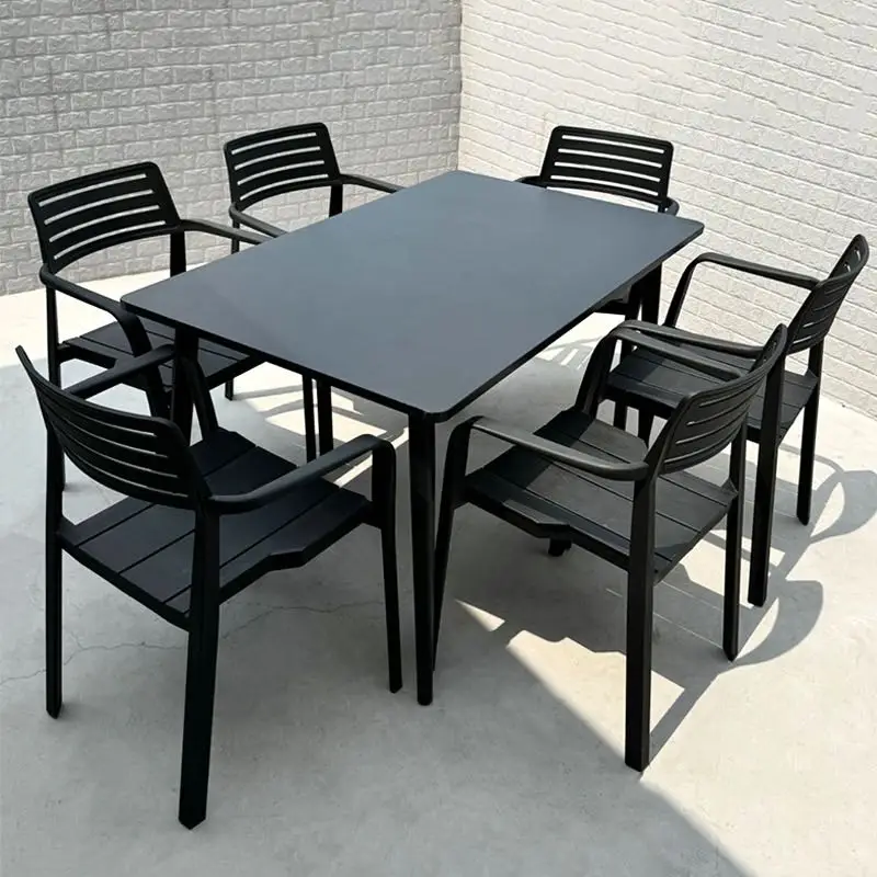 

Black carbon steel outdoor dining table and chair combination Internet celebrity outdoor restaurant outer setting area stainless