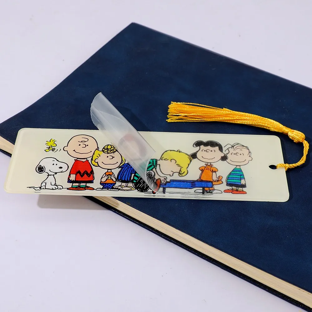 Cartoon Animated Dog Bookmark with Tassels, Cute Peanut Character Design, Inspiring Reading Quotes, and Interesting Page Tags.