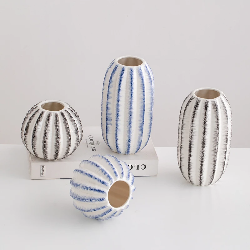 

Creative hand-drawn colorful striped ceramic vase - an elegant home decor piece for the living room tabletop, suitable for flowe