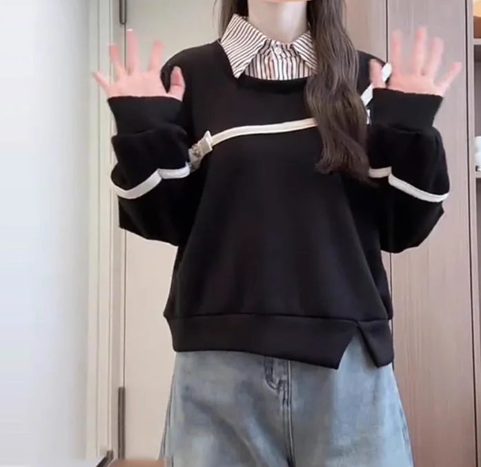 เสื้อสเวตเตอร์ผู้หญิงไซส์ใหญ่ สไตล์หวาน แต่งโบว์ ดูเหมือนสองชิ้น แฟชั่นอเนกประสงค์ ทรงหลวม แขนยาว ช่วยลดอายุ สีดำ เหมาะสำหรับฤดูใบไม้ร่วงและฤดูหนาว