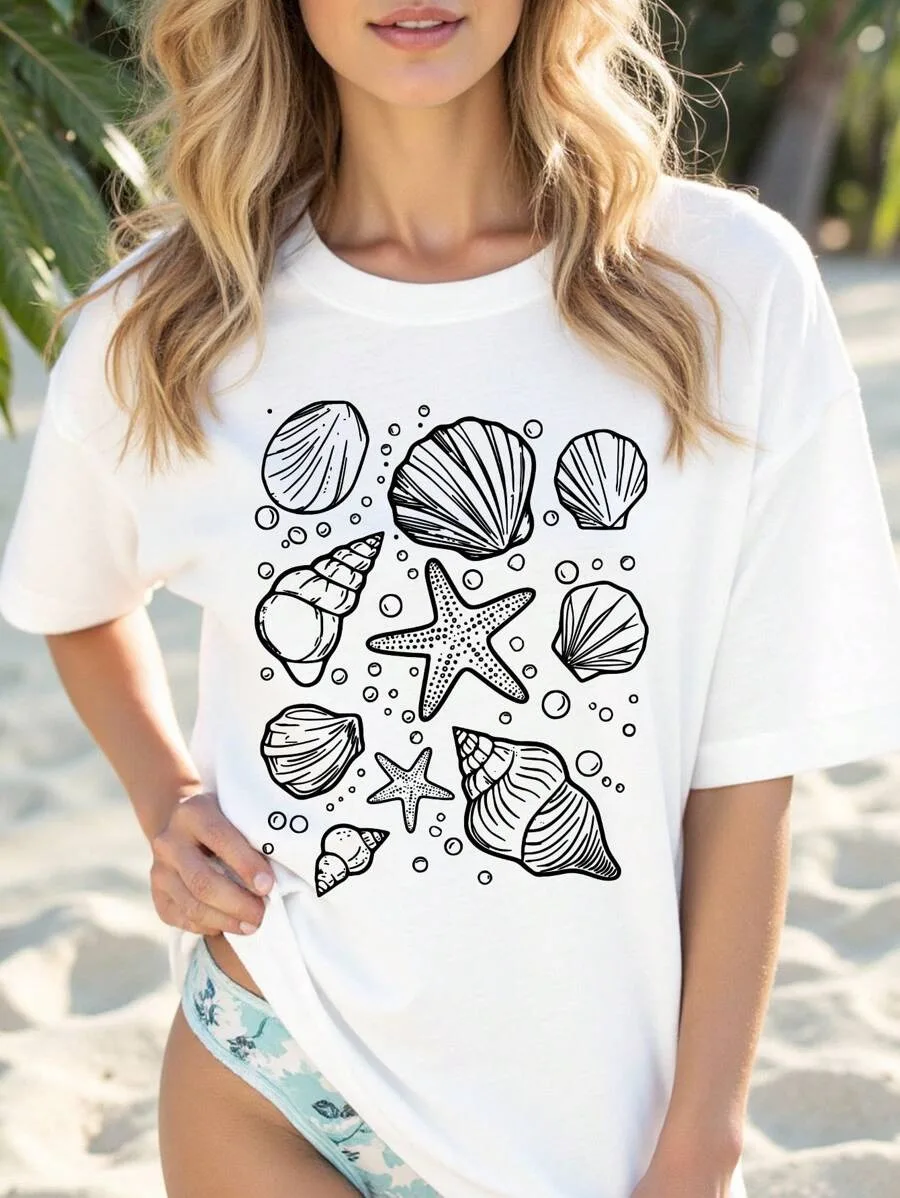 

Camiseta de mujer talla grande Adecuada para Fiskciones junto al Mar Tela suave и удобная Estampado de concha