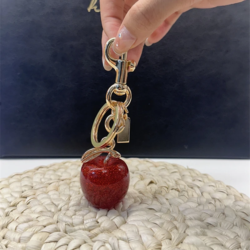 Para bolso de entrenador, bolso de hombro, colgante de cereza de cristal rojo, decoración, llavero exquisito, pieza de fijación