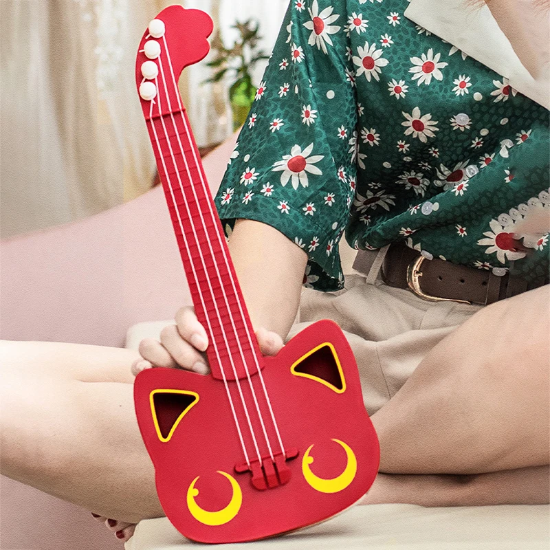 Guitarra de simulación para niños, instrumentos para principiantes de Ukri, forma de gato Adorable, regalo de cumpleaños