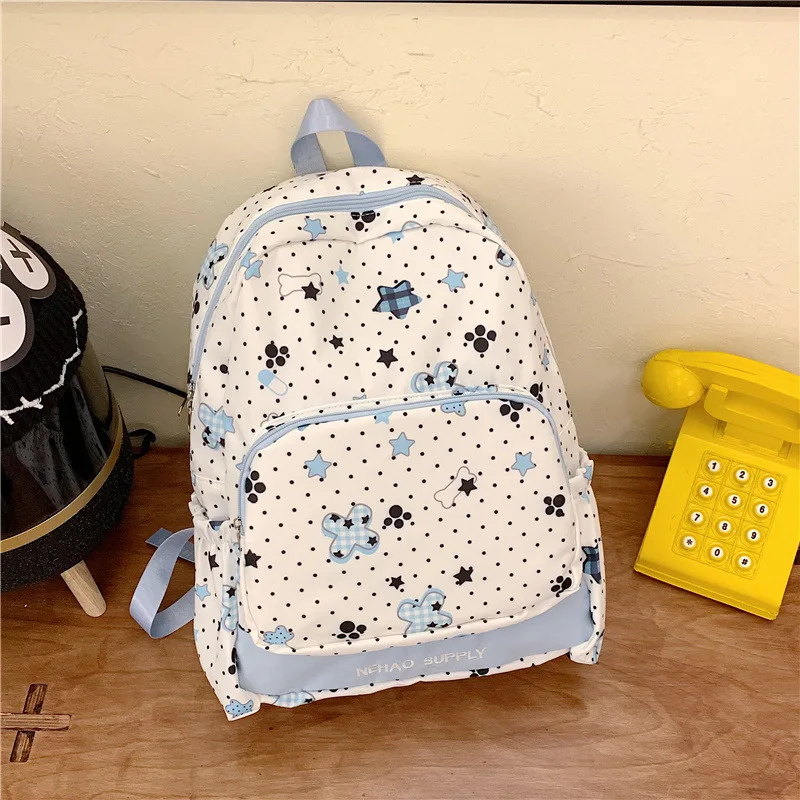 

College-style backpack for female junior high school students, Korean version, large capacity, star-patterned backpack for high