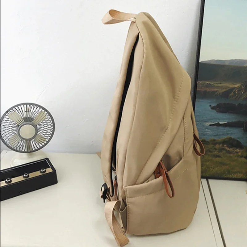 High end solid color high-capacity computer bag for male and female college students, outdoor leisure travel backpack