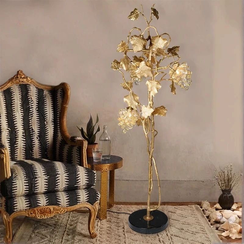 

Retro all-copper living room floor lamp sofa next to light luxury high-end creative grapes