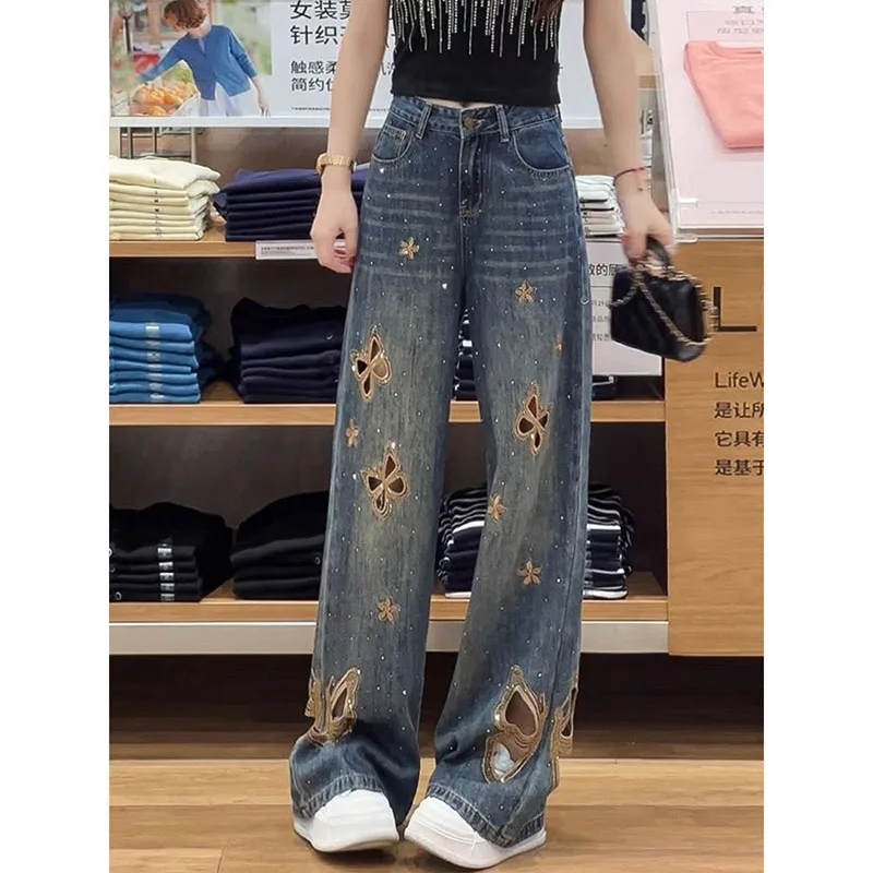 Nuevos pantalones vaqueros con mariposas bordadas caladas para mujer Primavera Verano nuevos pantalones vaqueros ajustados y ajustados de cintura alta a la moda para mujer