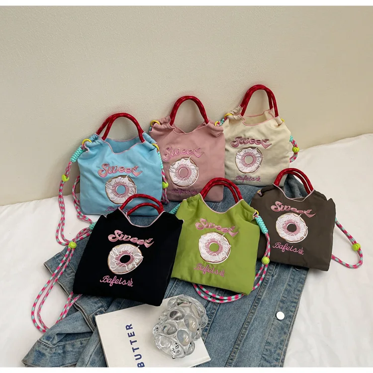 

Japanese-style embroidered doughnut, lightweight hand-held nylon bag, mini commuter single-shoulder crossbody small bag