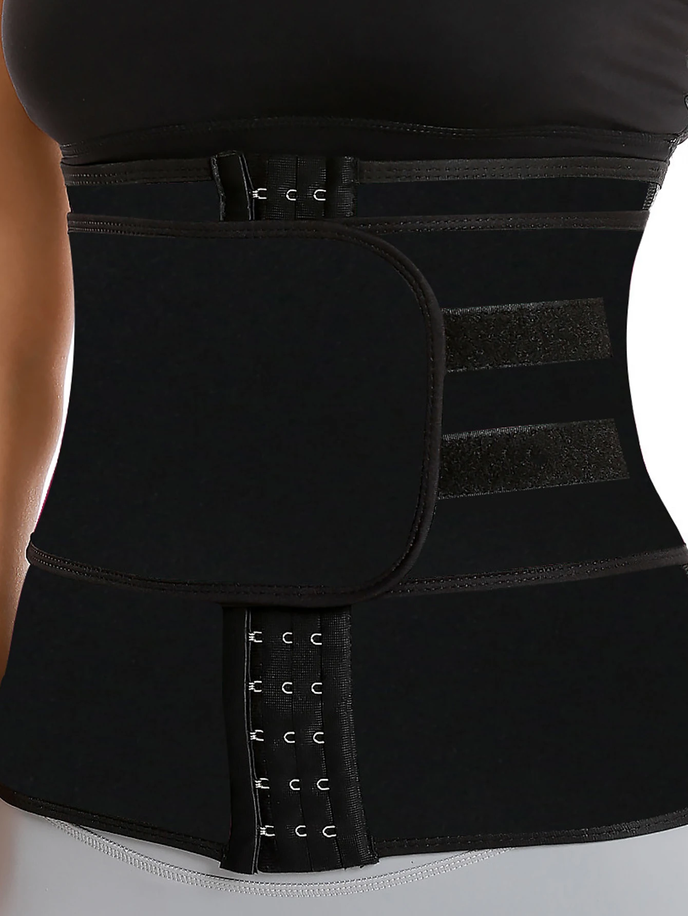 A Women's Waist Trainer Corset with Buckles – Slimming, Tight-Fitting, and Suitable for Sports