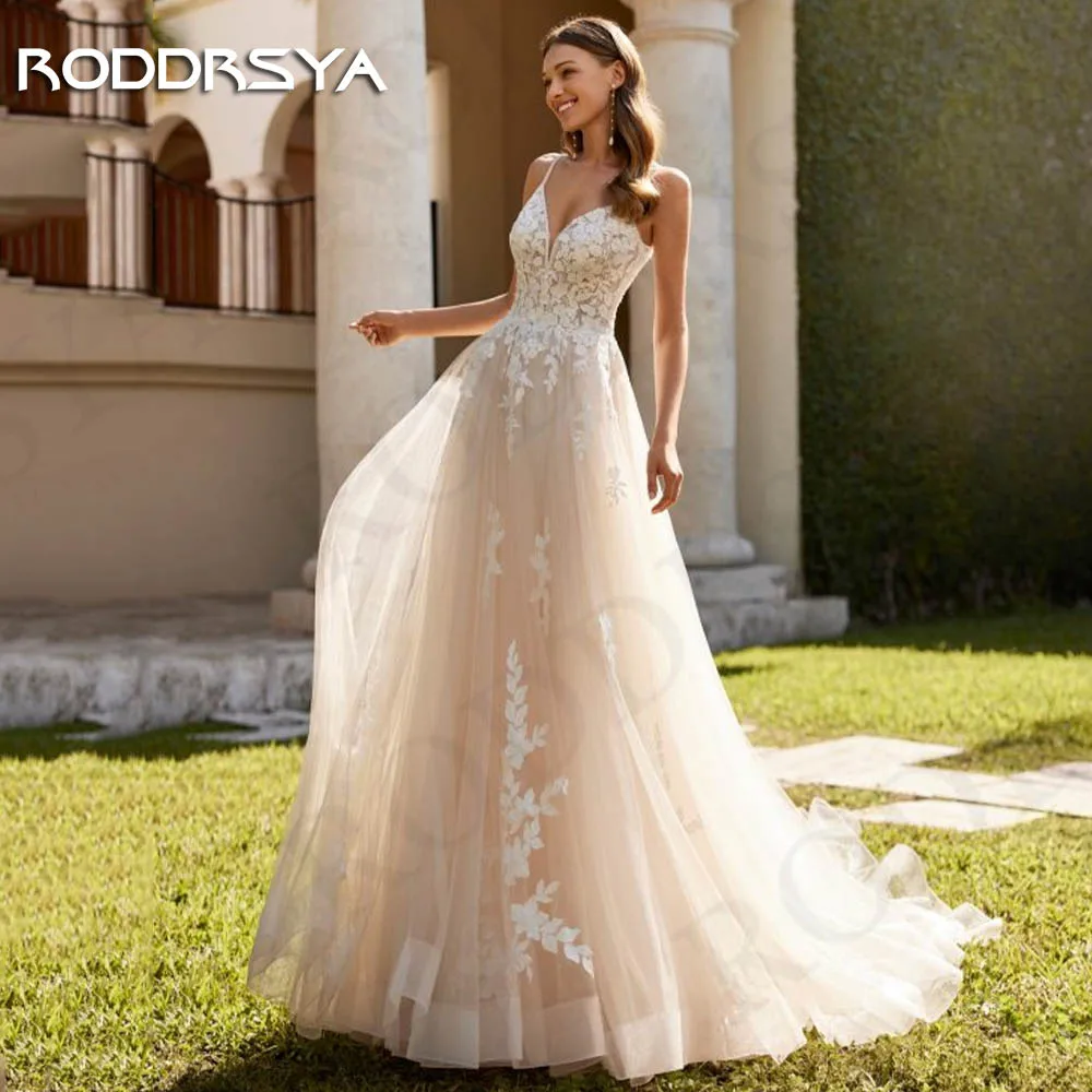 RODDRSYA Praia Vestidos De Casamento Para A Noiva Boho Backless Lace V Neck Vestido De Noiva Spaghetti Straps Applique Tulle vestido de novia Vestidos de noiva de praia para noivas Boho  Vestido de noiva com decote em