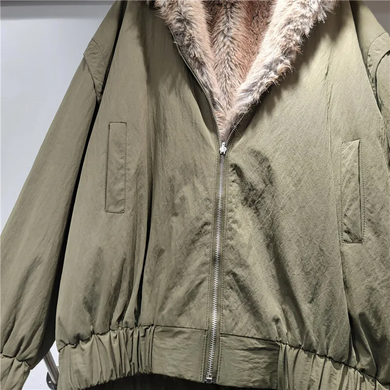 HKSH 2025 شتاء جديد المرأة عكسها معطف دافئ مقنعين فو الفراء سستة جيوب الأمريكية الرجعية أنيق Ins سترة سميكة HK15788