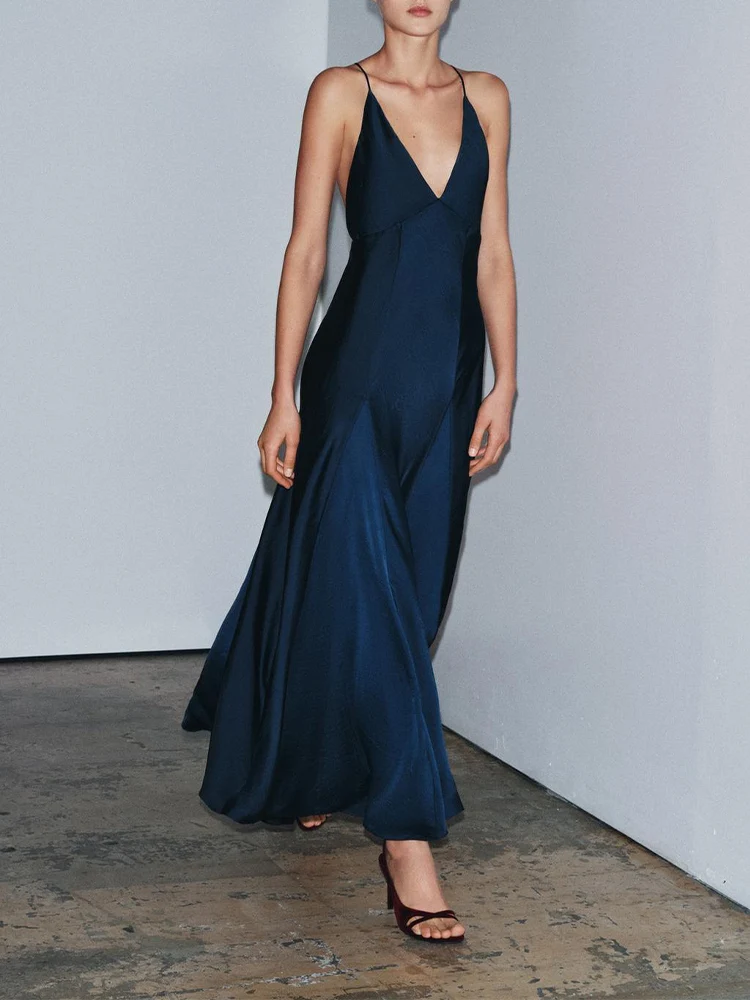 Nueva moda femenina de estilo europeo, vestido largo versátil y elegante de color sólido con cuello en V y tirantes finos con textura satinada de seda.