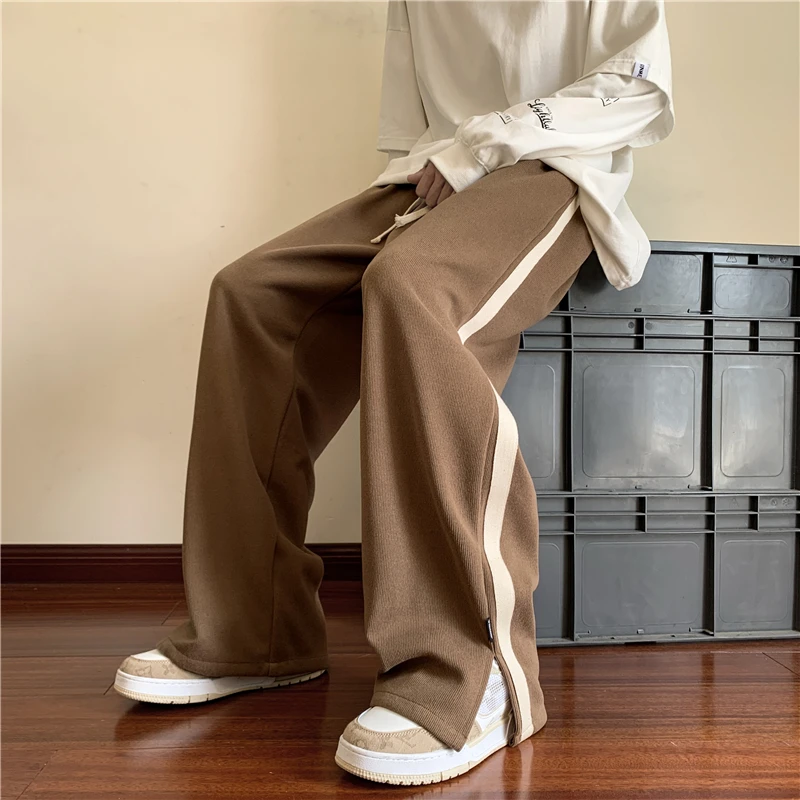 

Мужские спортивные повседневные брюки в стиле ретро, свободного кроя, осенние, новые, расклешенные, с разрезами, прямые, модные, спортивные штаны