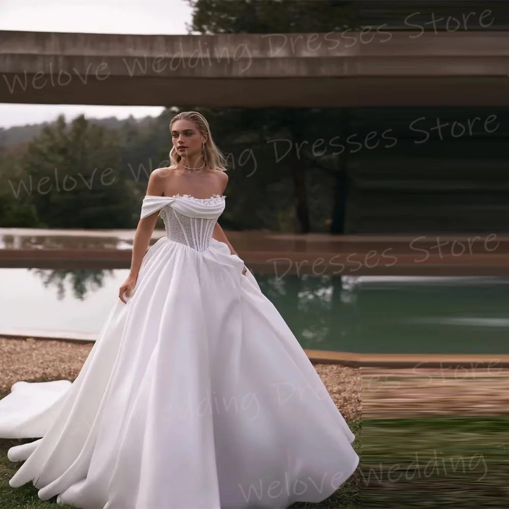 ชุดแต่งงานทรงเอไลน์สำหรับผู้หญิง แขนกุด แบบหรูหรา  ชุดเจ้าสาวสั่งตัดได้  แบบเปิดไหล่  ประดับเลื่อม  ชุดเจ้าสาว