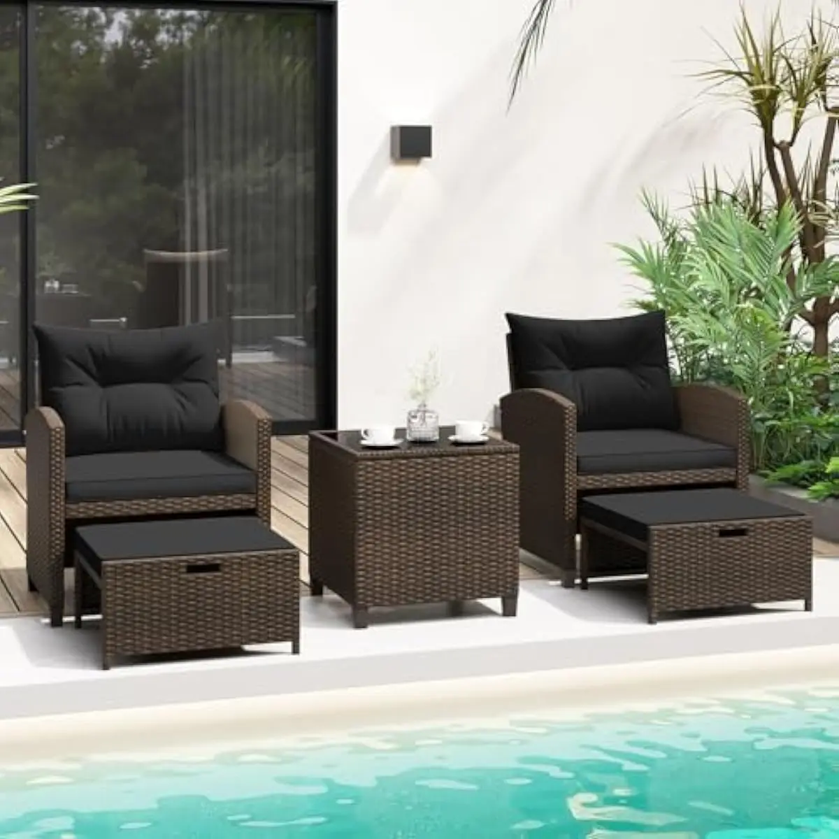 5-piece modern outdoor lounge set featuring 2 PE rattan armchairs, 2 matching ottomans, and a tempered glass coffee table with s