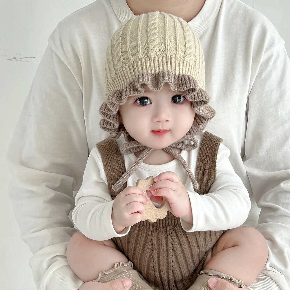 

Милая детская вязаная шапка с рюшами, теплая утолщенная шерстяная защитная шапка для ушей для младенцев, лоскутная цветная детская зимняя шапка-бини со шнуровкой