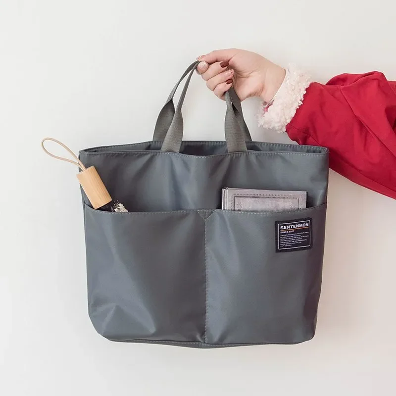 حقيبة مقاومة للماء محمولة باليد من قماش أكسفورد الأفقي بسعة كبيرة حقيبة كمبيوتر للخروج في العمل حقيبة يد كتف