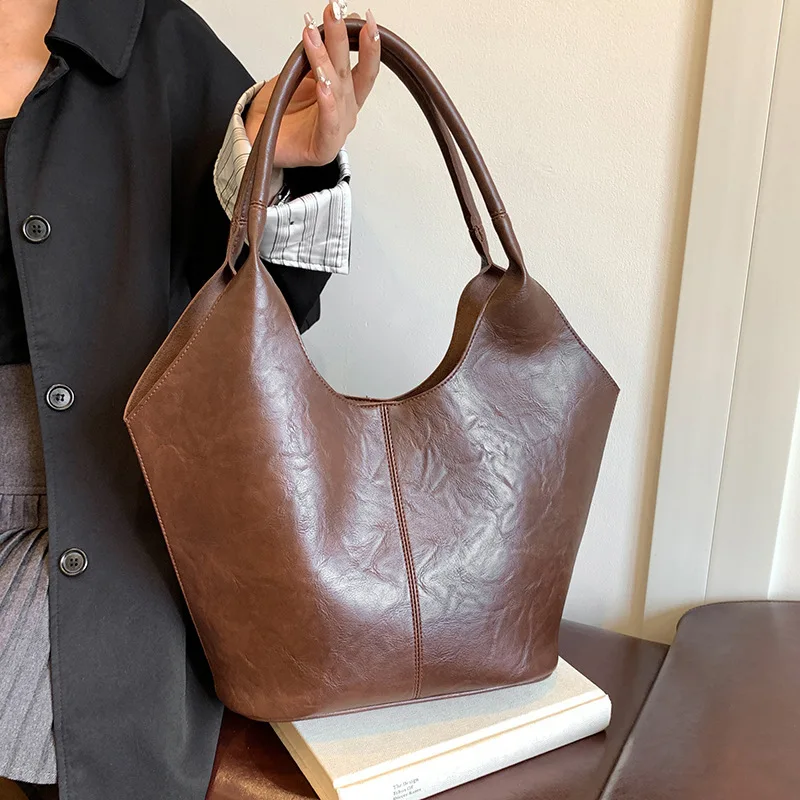 

Модная женская сумка 2025 года с внутренней сумкой под мышками большой вместимости, универсальной и нишевой сумкой-тоут.