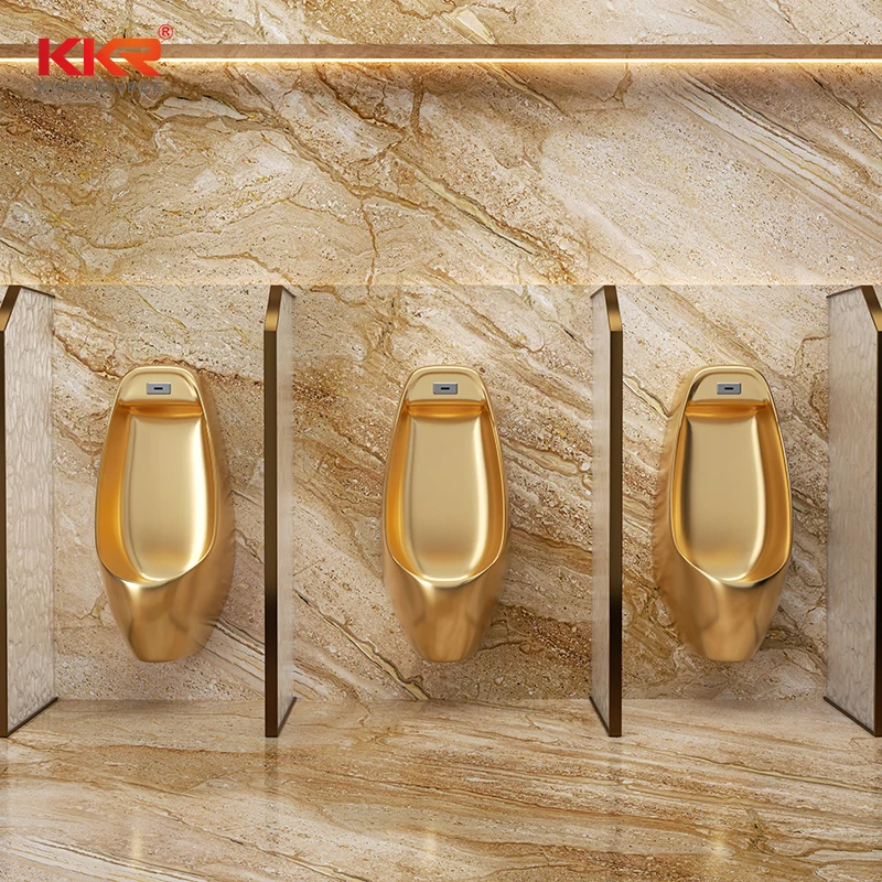 ADA-compliant premium gold ceramic urinals with a modern design style for hotel amenities