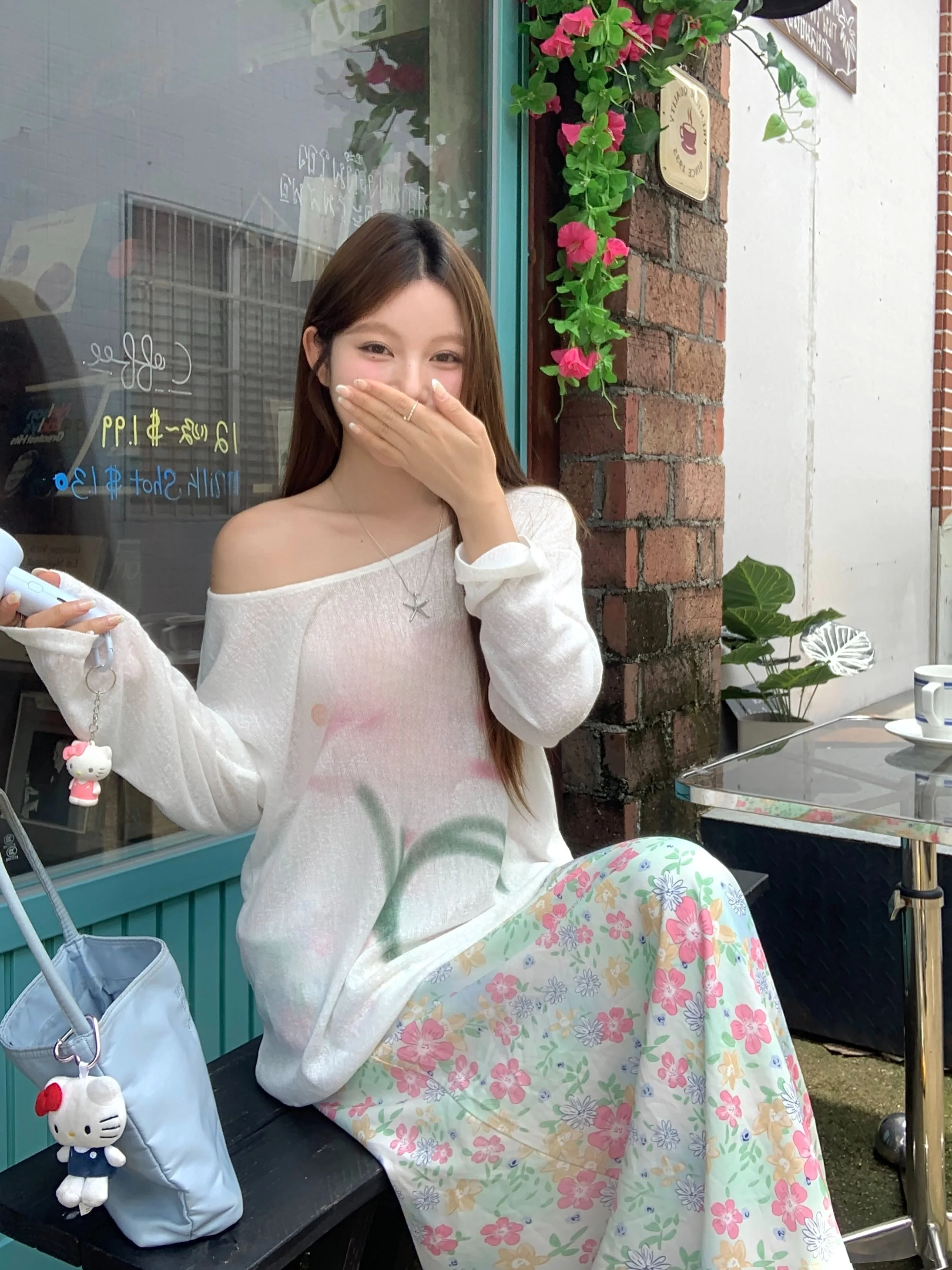 T-shirt da donna estiva casual ampia lunga Sve bianca con protezione solare T-shirt coreana con stampa Sle Moisture ng Pianta motivo floreale