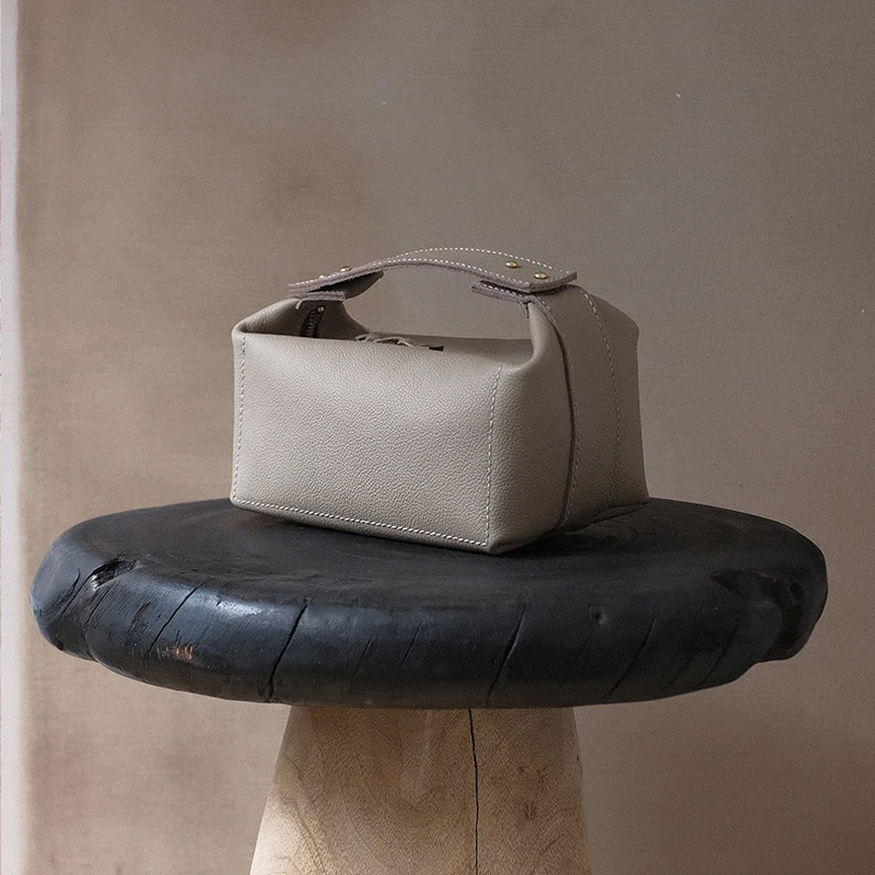 

Top-grain cowhide leather litchi pattern handmade bag women's wristlet minimalist style design bag