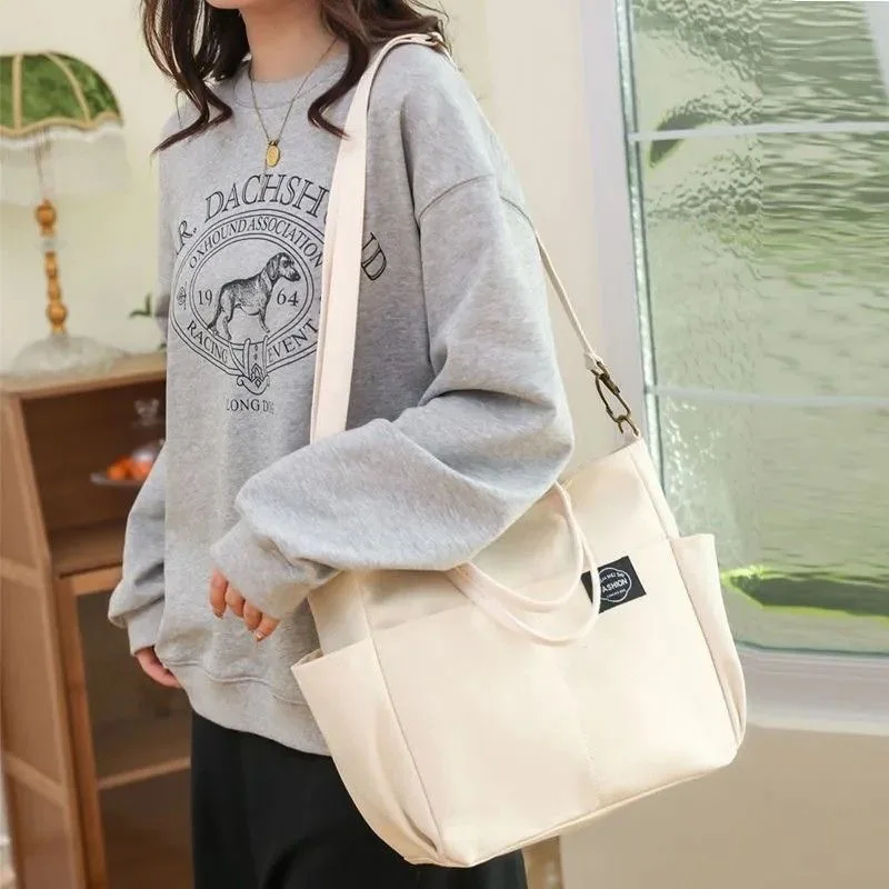 2024 New Fashion and Large Capacity Commuter Tote Bag for Men and Women Shopping Single Shoulder Crossbody Bag High end design