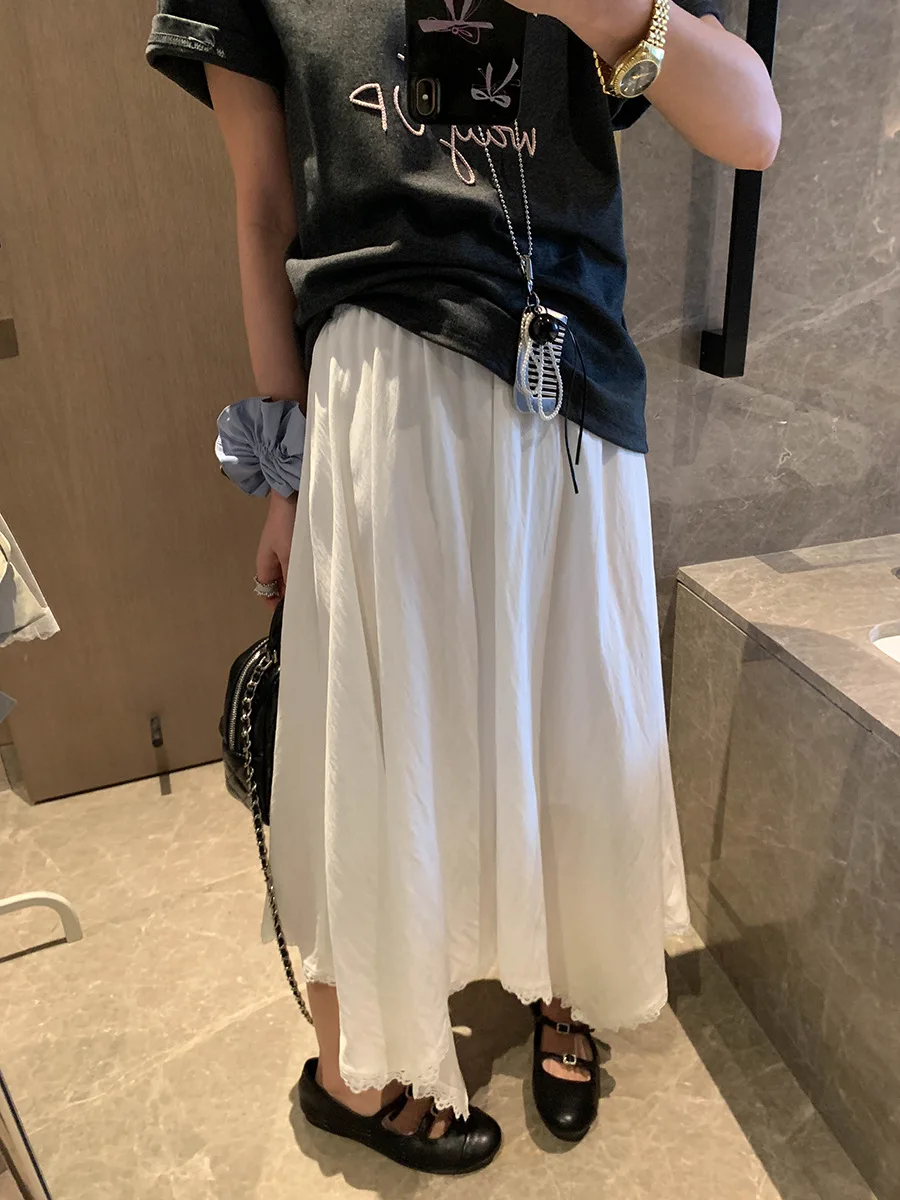 

Весенняя женская повседневная юбка А-силуэта с асимметричным кроем, кружевными вставками, эластичной высокой талией и эффектом похудения, однотонная.