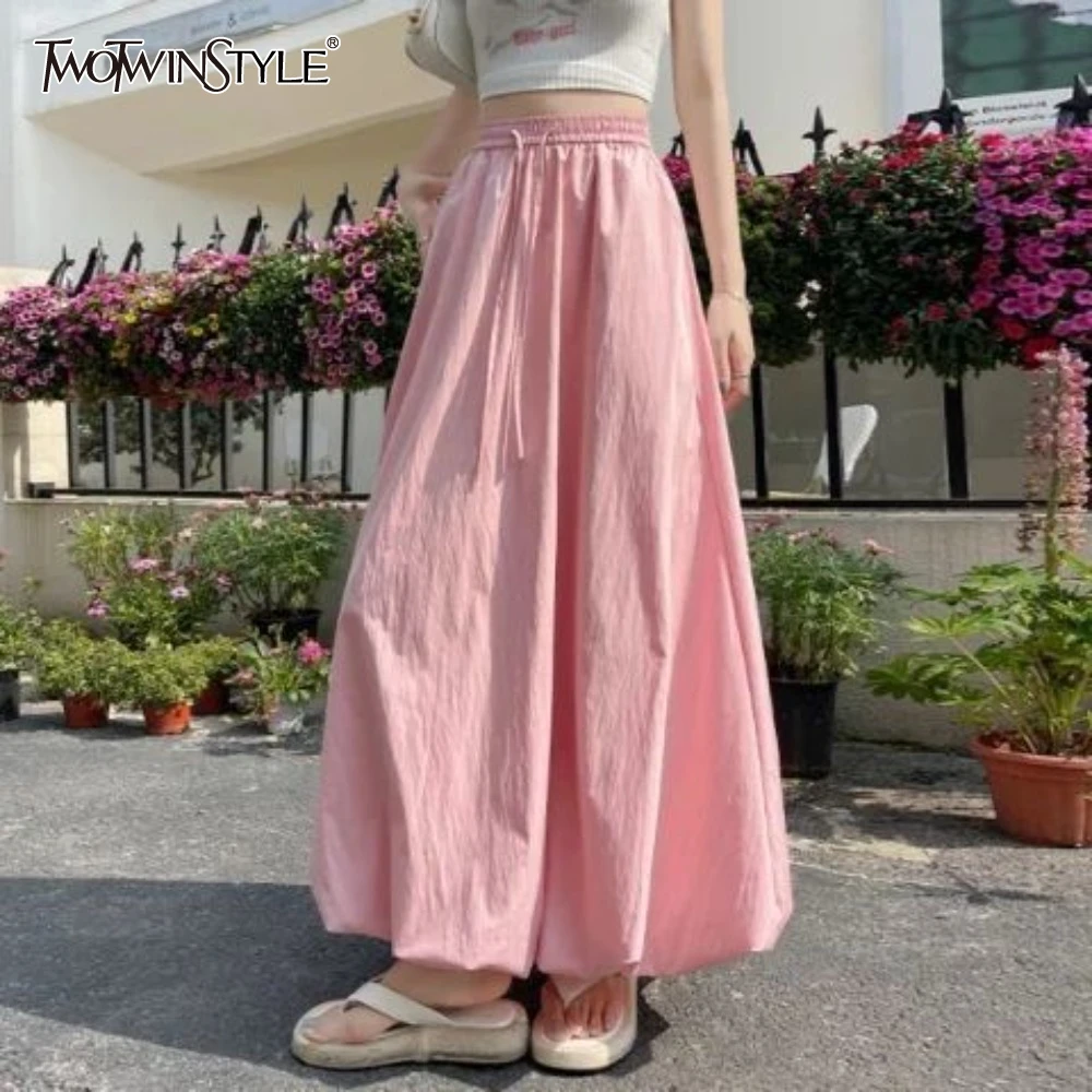 

TWOTWINSTYLE Yellow Spliced Bandage Women's Flower Bud Skirt High Waist Sweet Temprament Long Skirts Female Fashion Summer New