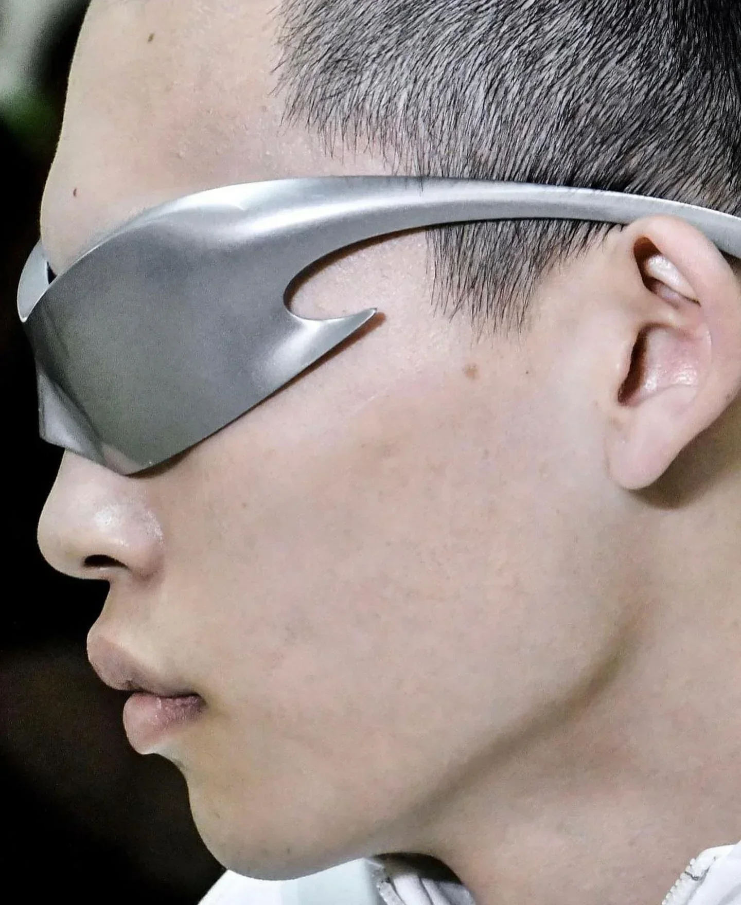 

Avant-garde, fashionable, retro, and shapely connected sunglasses with a futuristic style and a wasteland era design. Sunglasses