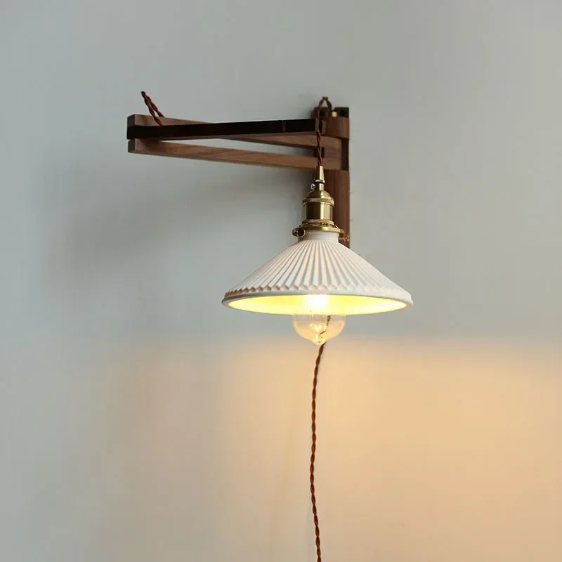 

Vintage foldable solid wood walnut wood wall lamp wabi-sabi Japanese brass ceramic homestay bedroom bedside wall lamp