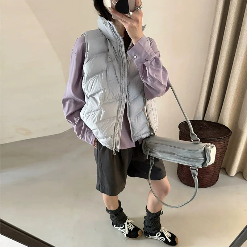 Women Fashion Autumn New 2025 Stand Collar Elegant Down Coats Warm Outerwear Casual Belt Sleeveless Winter Women Vests Jackets