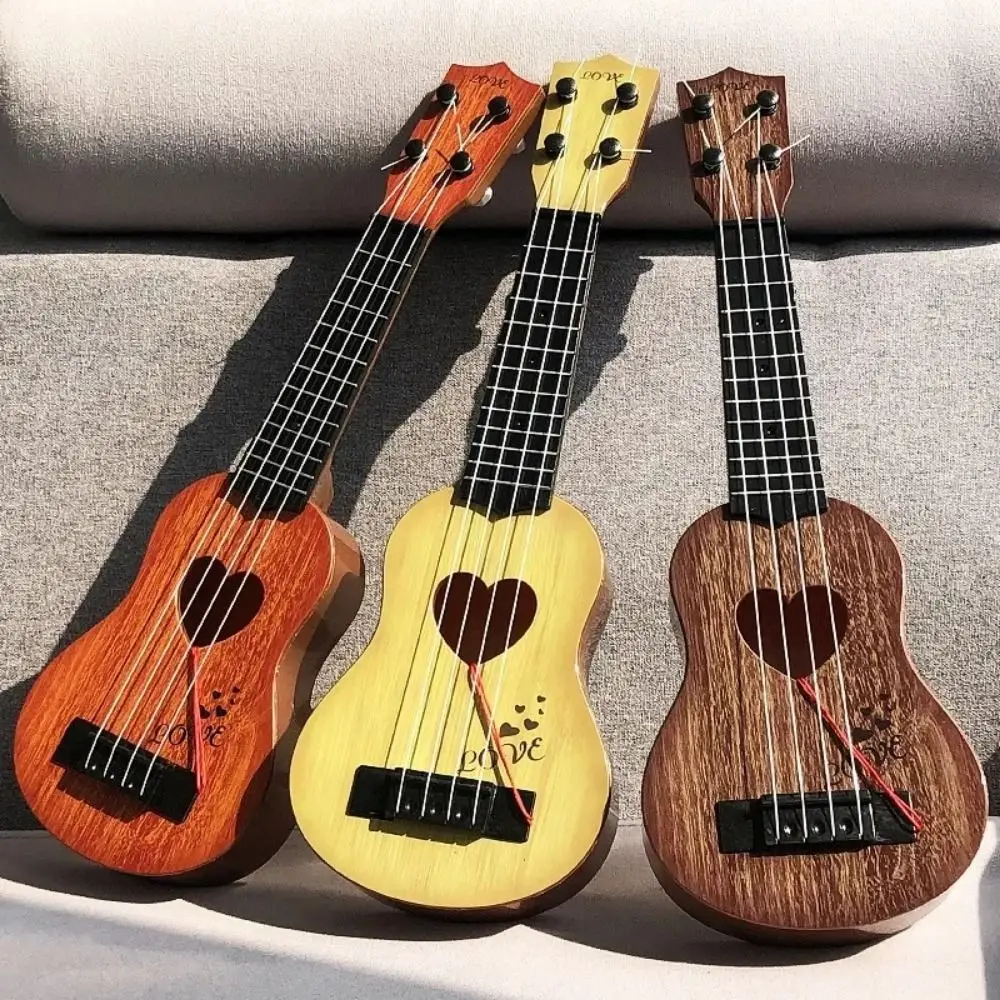 4 สาย Ukulele เครื่องดนตรีของเล่น Yukrili ของเล่นคลาสสิกจําลอง Ukulele ของเล่นเล่นปรับ String KNOB