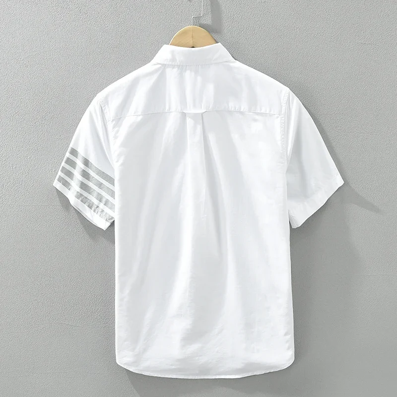 Camisa blanca de manga corta para hombre, camisas informales con cuello vuelto, ropa holgada de algodón a la moda, novedad de verano, 2024