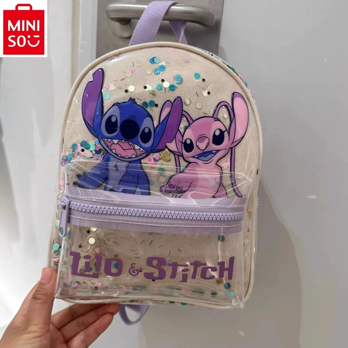 

MINISO Disney Cartoon Stitch Printed Transparent Glitter Star Decoration Student Large Capacity Children's Backpack