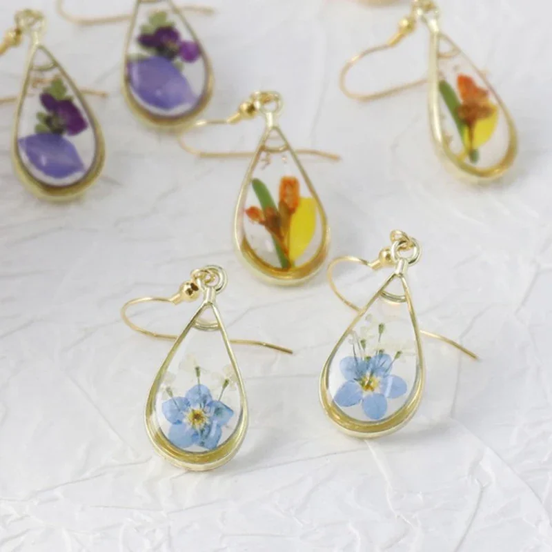 

Elegant Natural Flower Earrings Handmaking Transparent Resin Pressed Real Flowers Earrings Natural Plant Drop Earrings Wholesale
