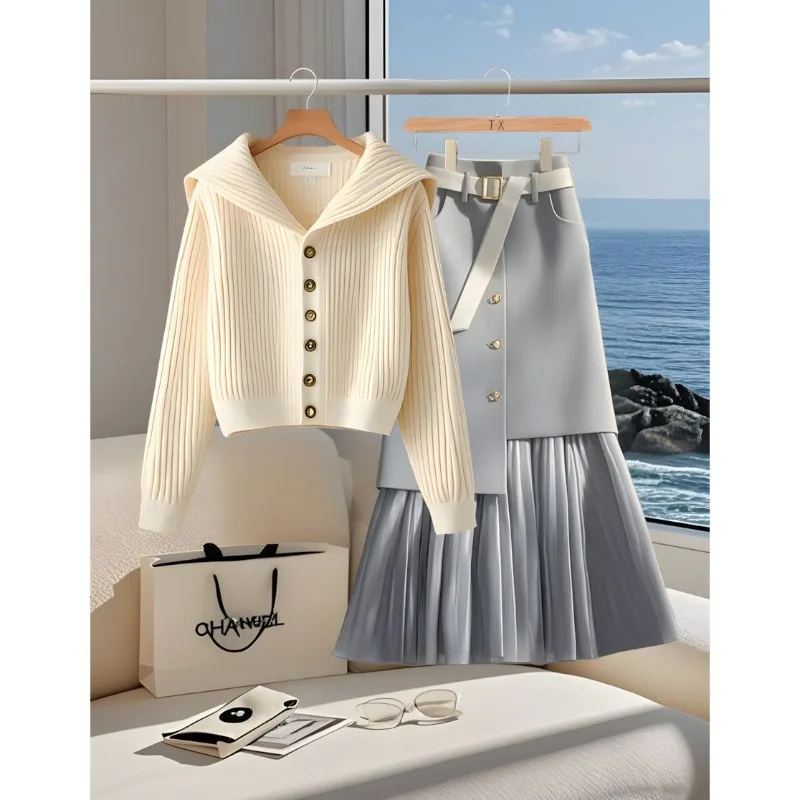 ชุดเสื้อคาร์ดิแกนถักนิตติ้งอเนกประสงค์สไตล์ต่างประเทศสุดชิคสำหรับฤดูใบไม้ผลิและฤดูใบไม้ร่วง พร้อมกระโปรงเข้าชุด ไม่ซ้ำใคร