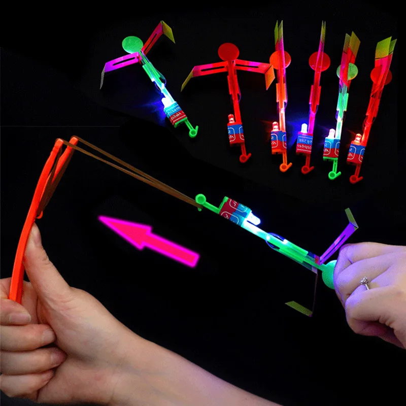 5Pcs Amazing Light Arrow Rocket Helicopter Flying Light Glow In The Dark Party Fun Gift Rubber Band Catapult