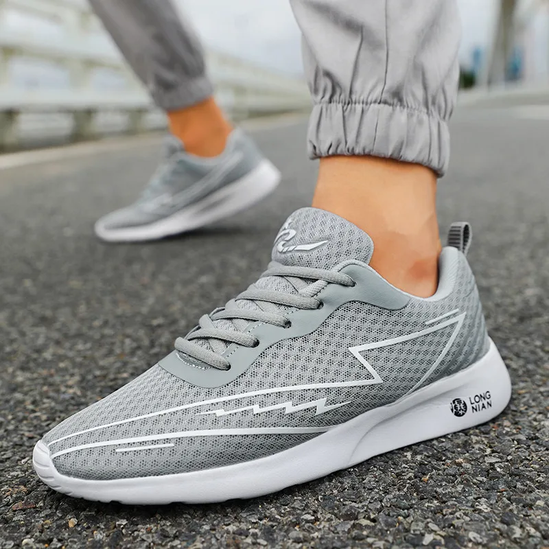 Hete Verkoop Mesh Hardloopschoenen Voor Heren Outdoor Lichtgewicht Ademende Damessneakers Mode Casual Witte Sportschoenen Heren Dames