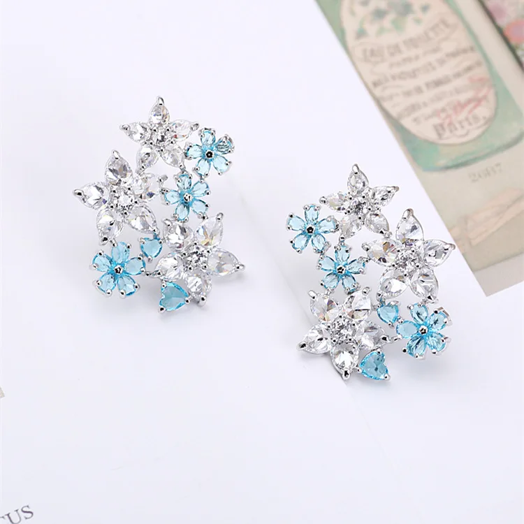 Copper Floral Zircon Earrings - Sky Blue Transparent Zircon Cluster Leaf Hollow Design White Background