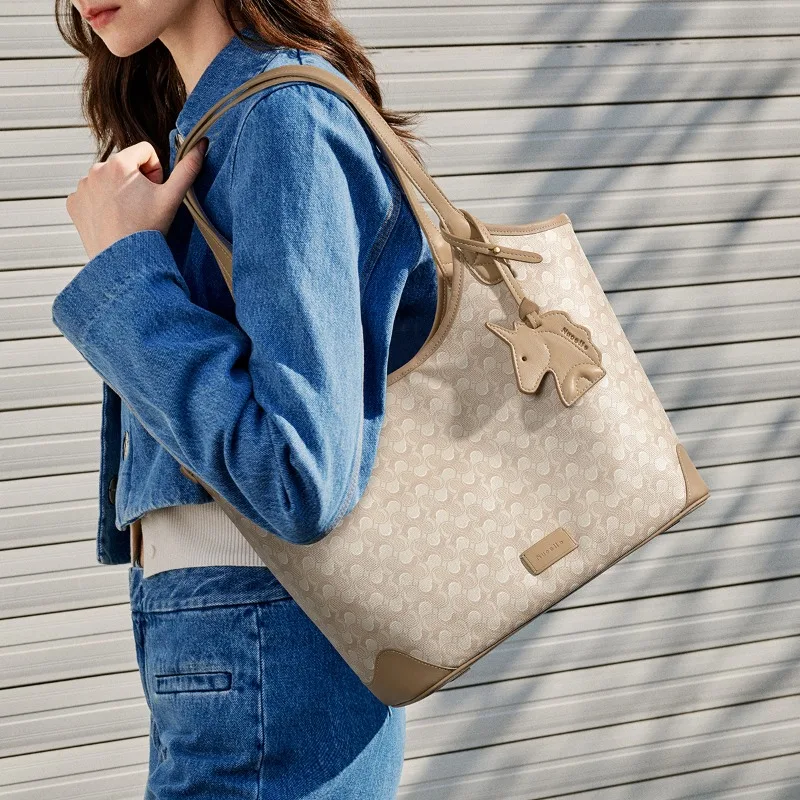 Bolso de mano NU Wave 2025 Primavera y novedad de verano bolso de hombro para ir al trabajo de gran capacidad para mujer bolso Premium Sense para niños y madres