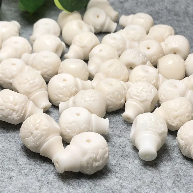 Factory Supply Ivory Nut Integrated Tee Beast Faucet Water Drop Pagoda18mmOne piece dropshipping