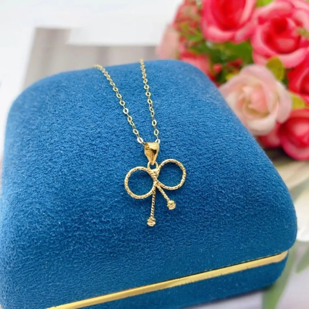 

Real Pure 18K Yellow Gold Lucky Men Women Hollow Carved Circle Bowknot Pendant